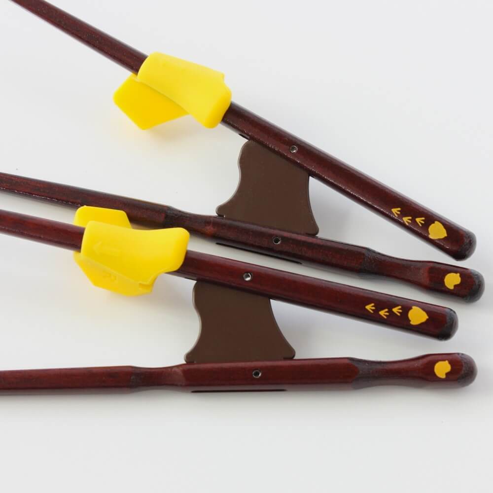 close up of handles of training chopsticks