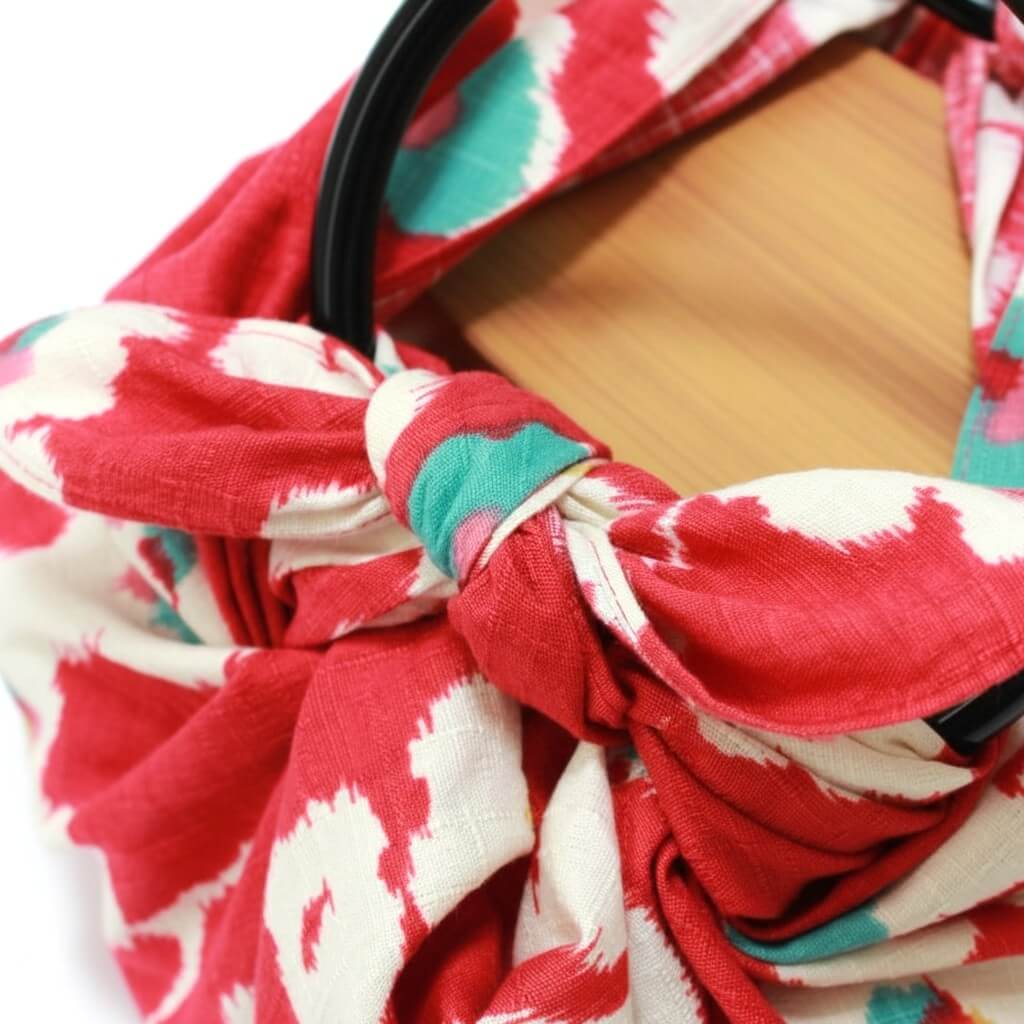 close up of the knot used to tie the handle rings to make a furoshiki bag