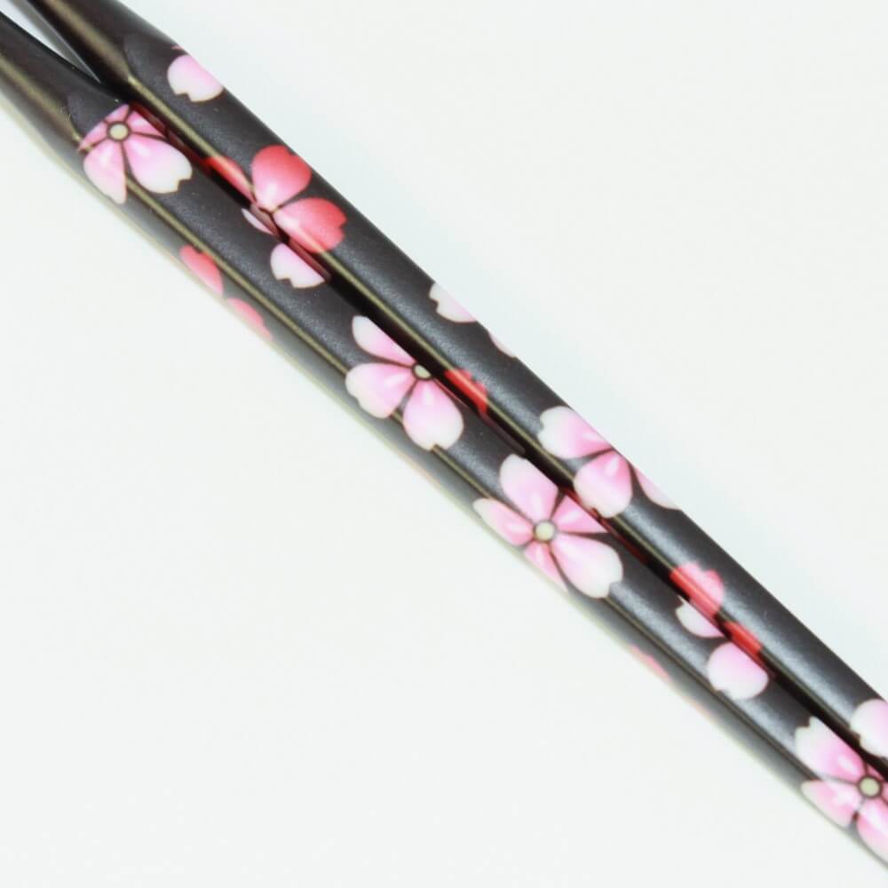 close up sakura black pattern chopsticks