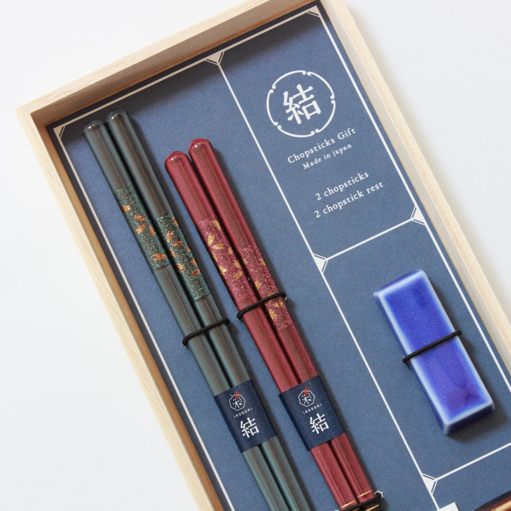close up showing chopsticks in gift box