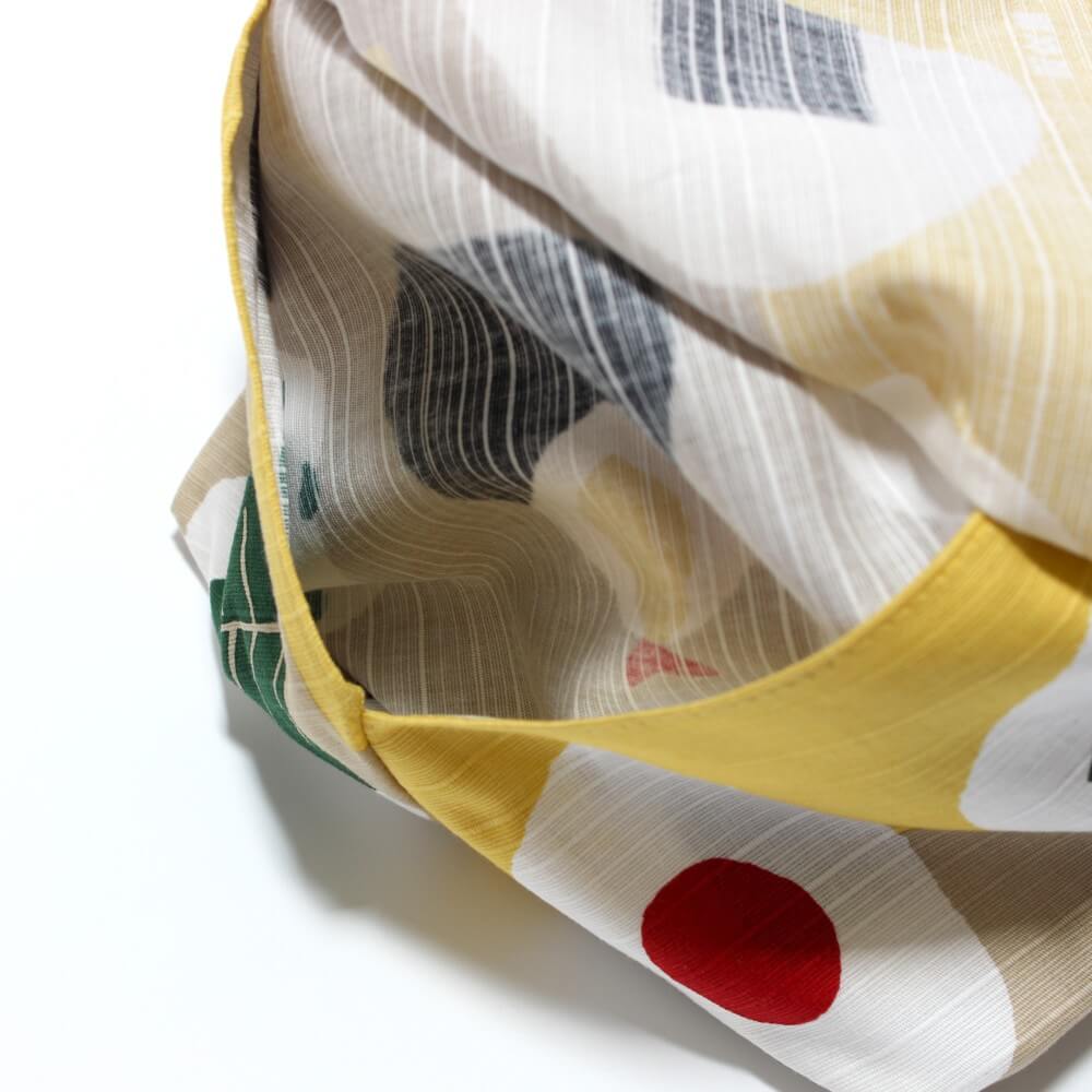 close up of the side picof the onigiri tsutsumi kinchaku bento lunch bag