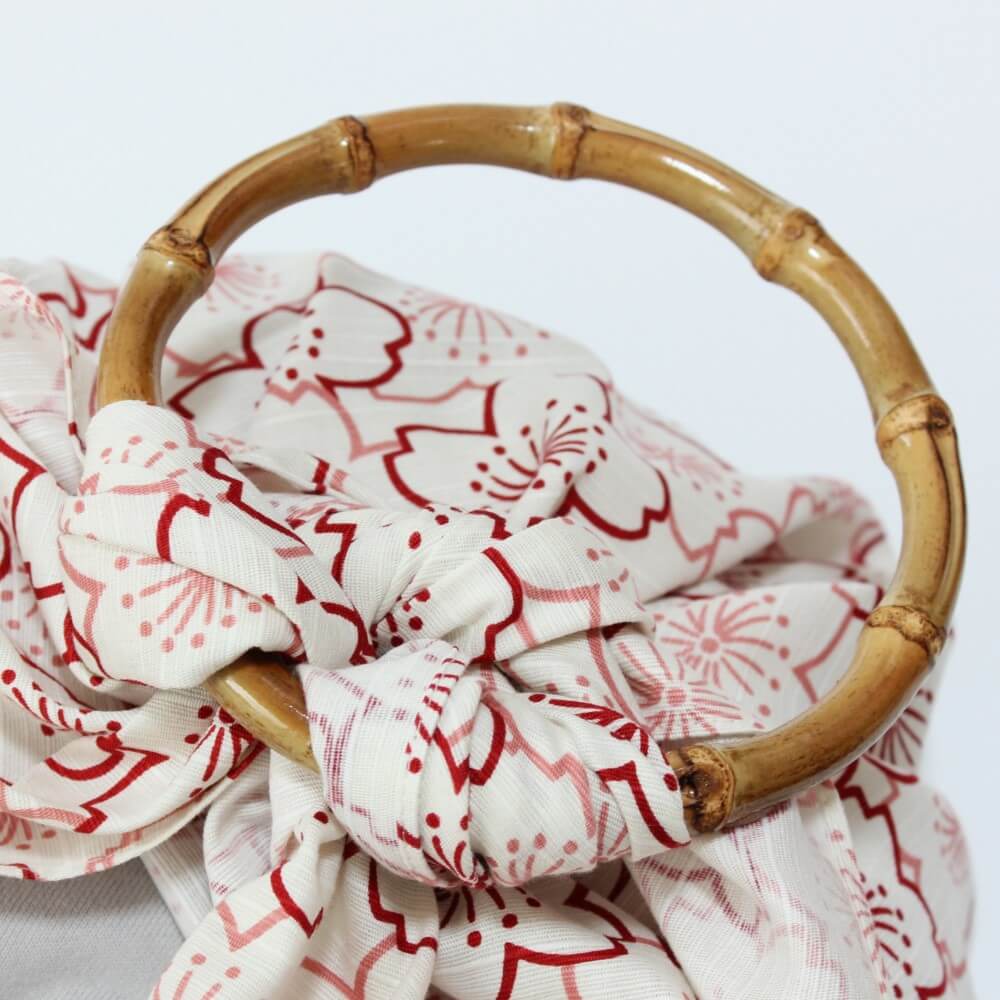 close up single bamboo handle ring furoshiki