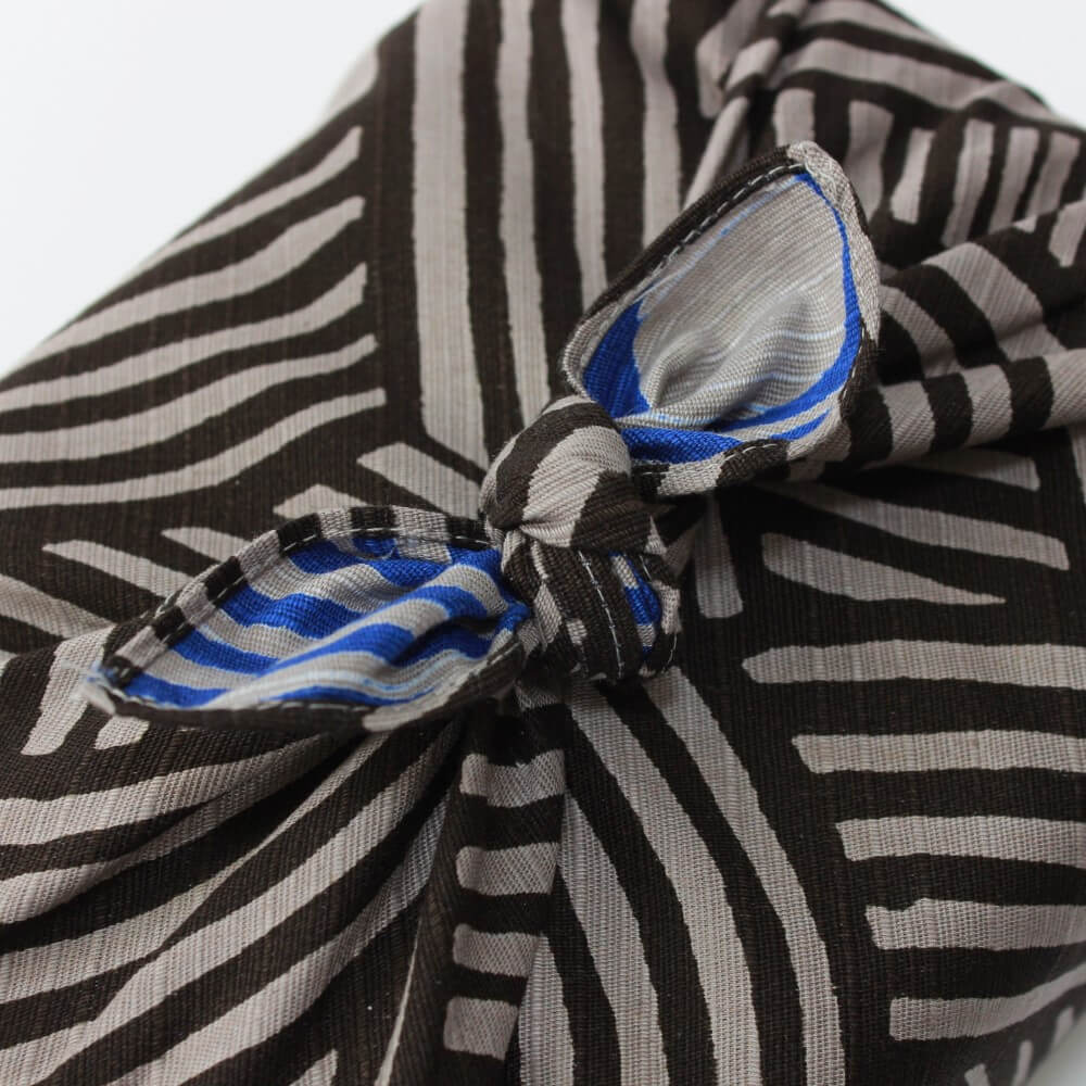 close up of tied knot furoshii dark grey side