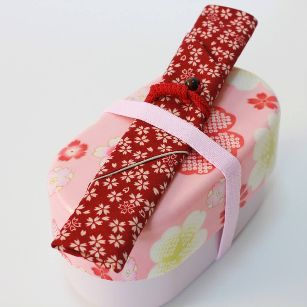 close up chopsticks case and sakura bento box pink