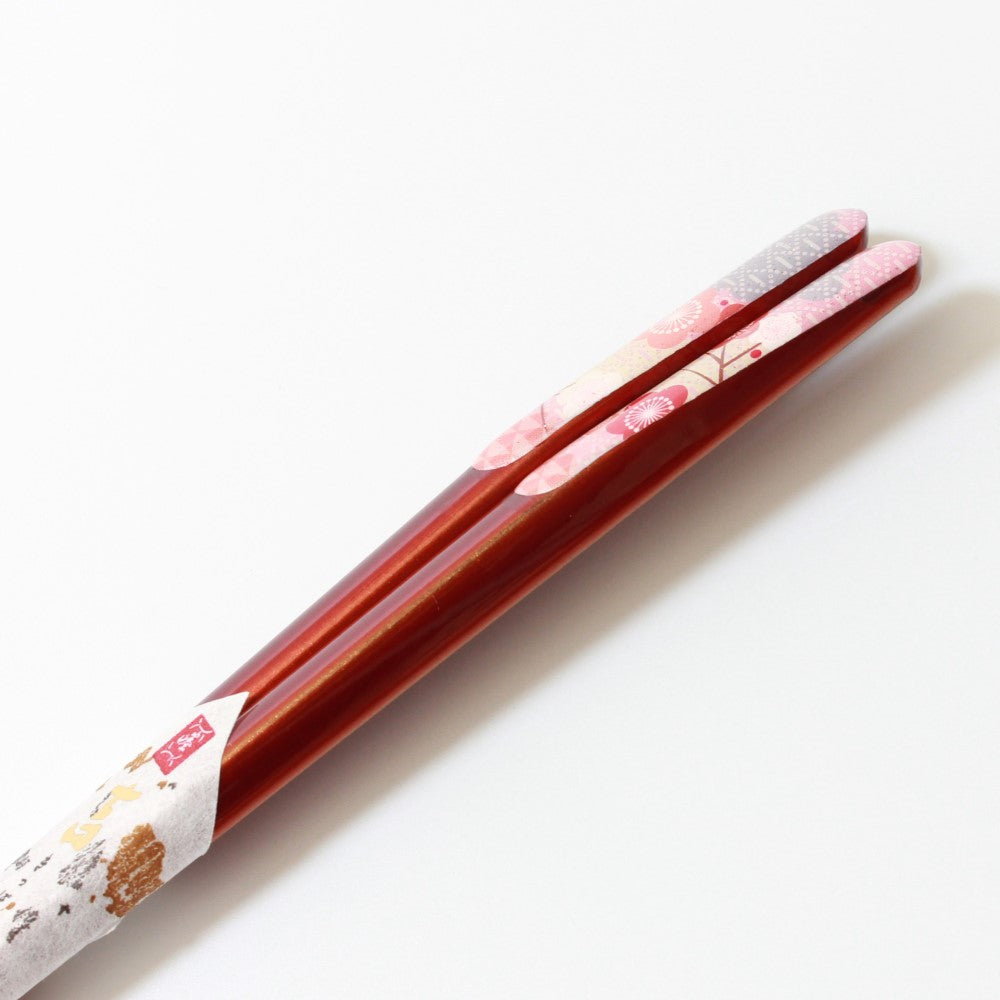 close up showing shaved handles of fukuju red chopsticks