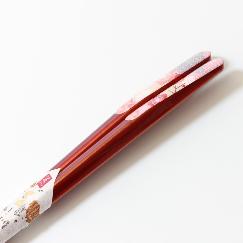 close up handles fukju red chopsticks