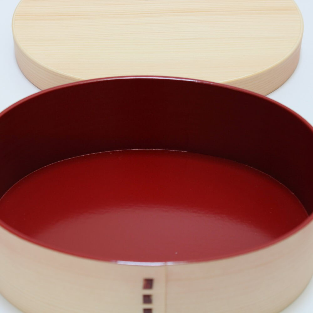 empty shiraki magewappa bento box showing red paint inside