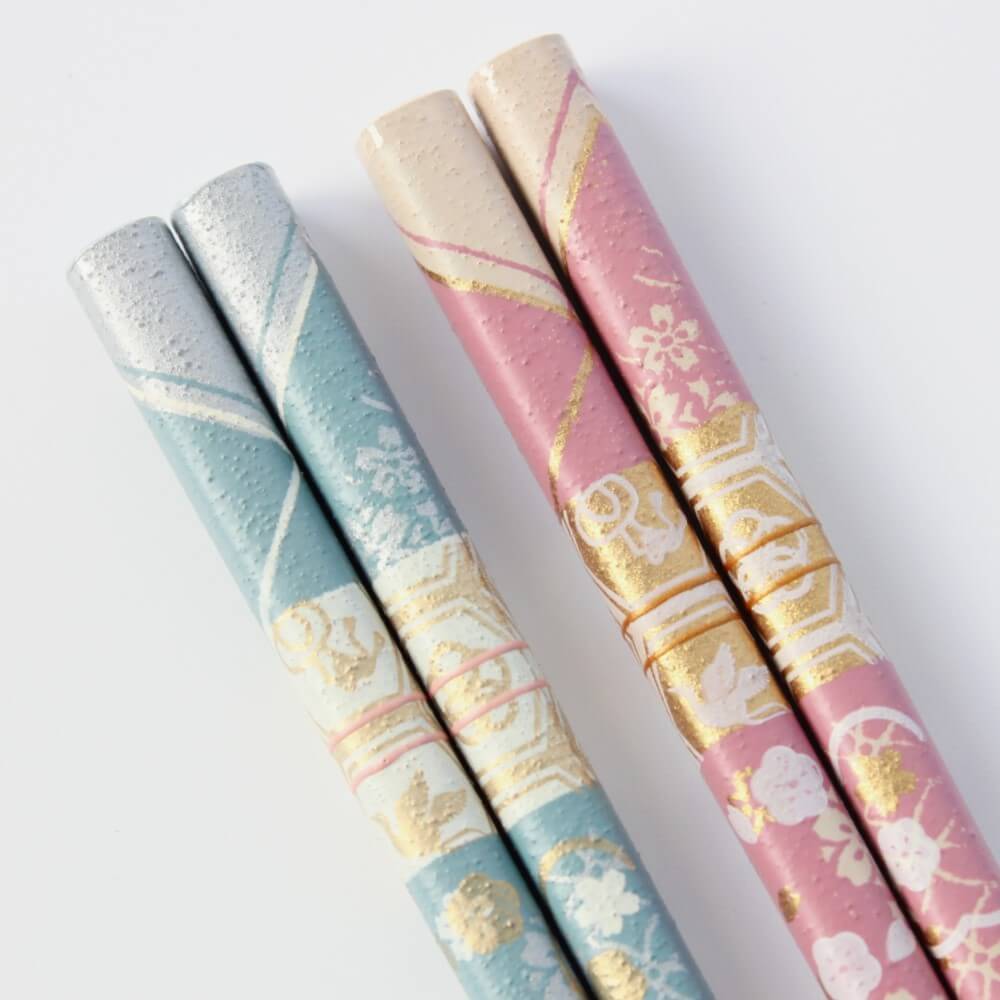 extra zoomed in blue and pink chopsticks handles showing surface texture and patterns