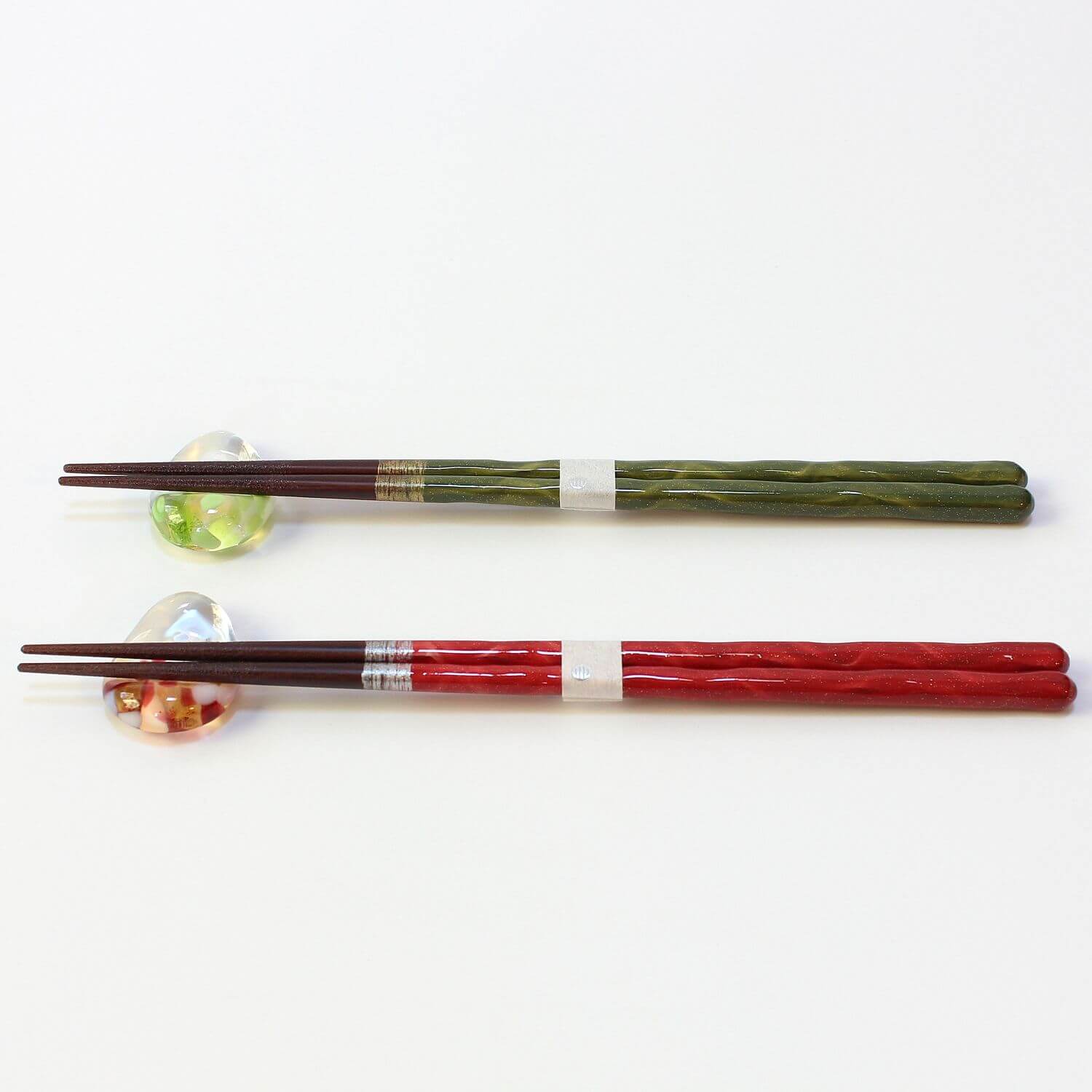 red and green nagisa chopsticks on rests