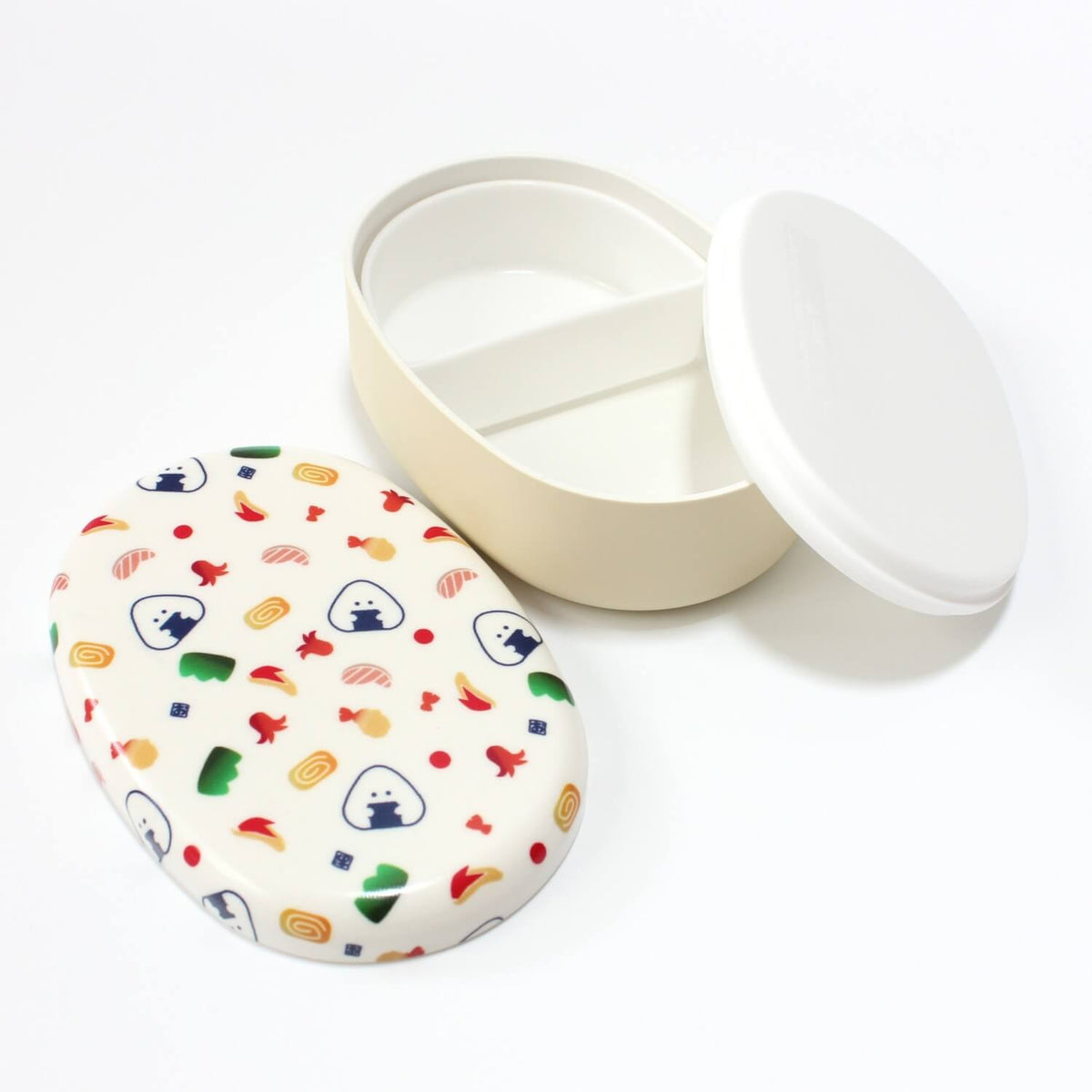onigiri and bento sides white bento box with lids opened