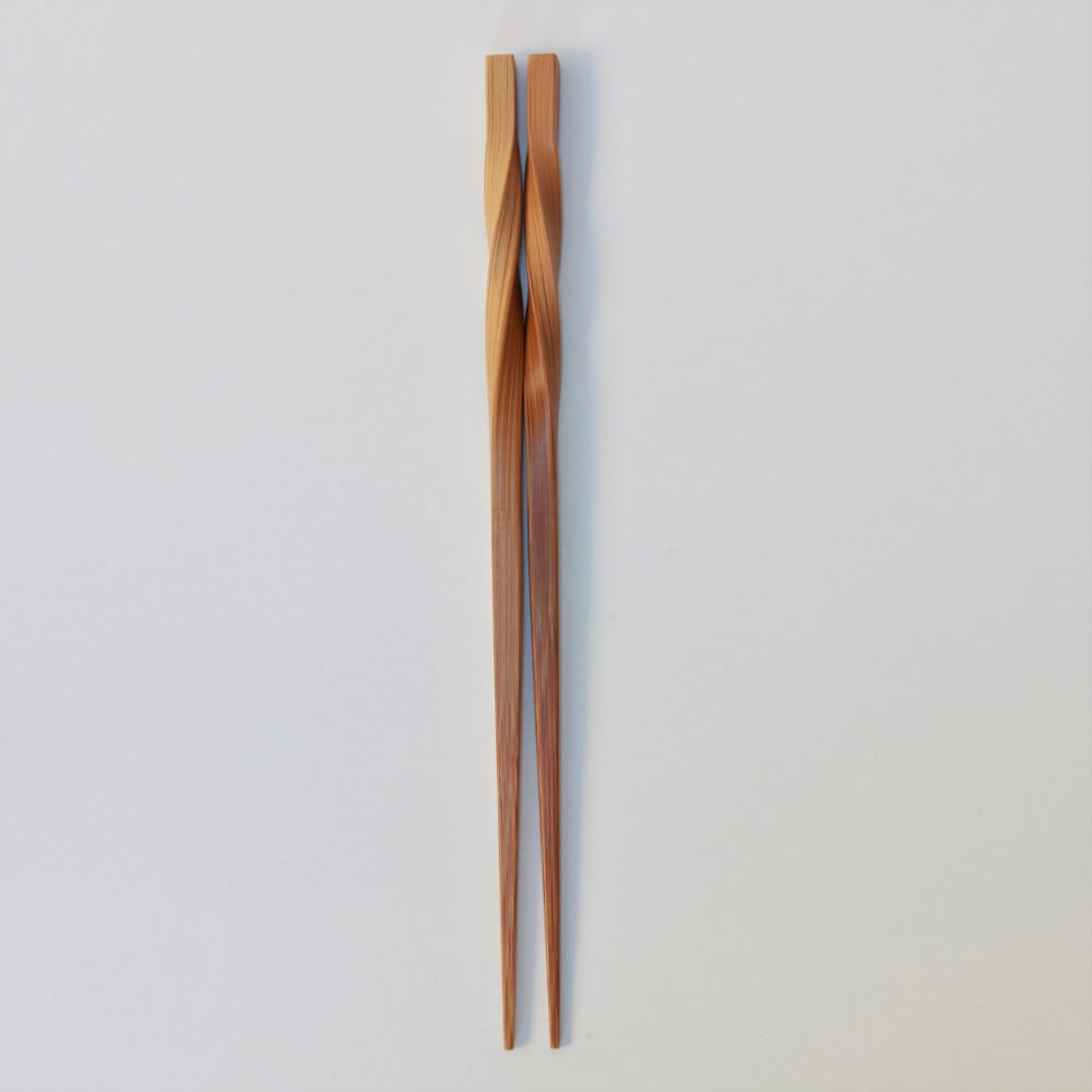 overhead photo bamboo chopsticks twisted