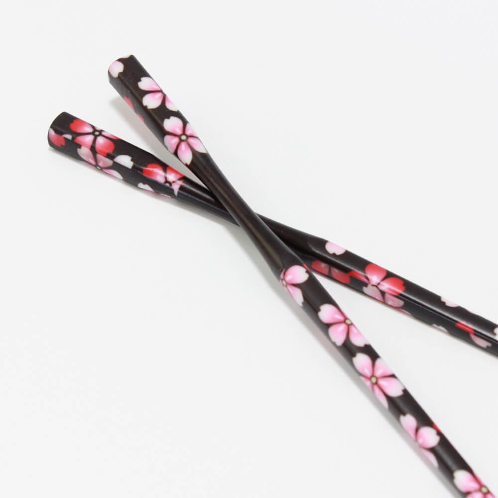 pink red sakura flowers chopsticks