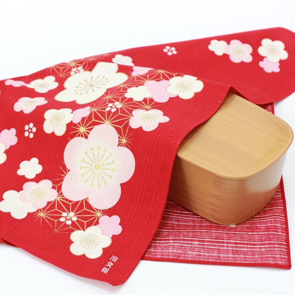 red furoshiki asanoha plum flowers covering bento box