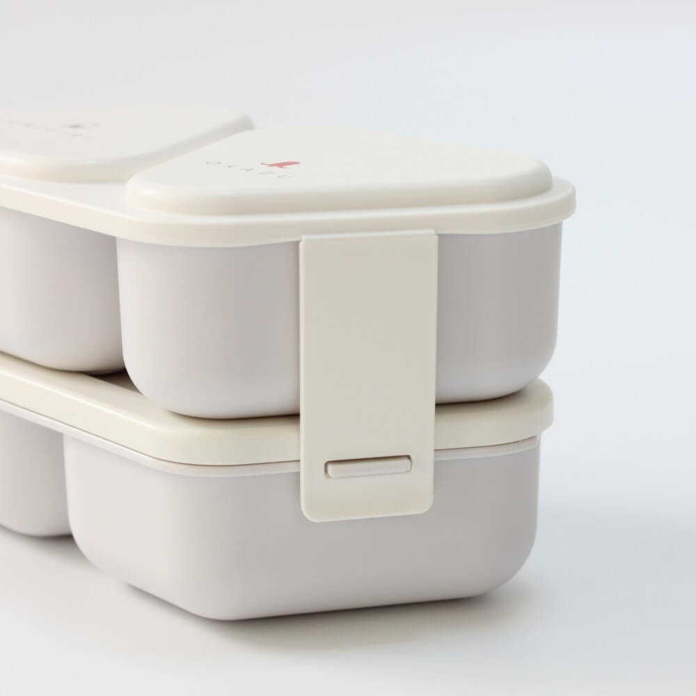 close up of side of 2 tiered onigiri bento case showing side latches