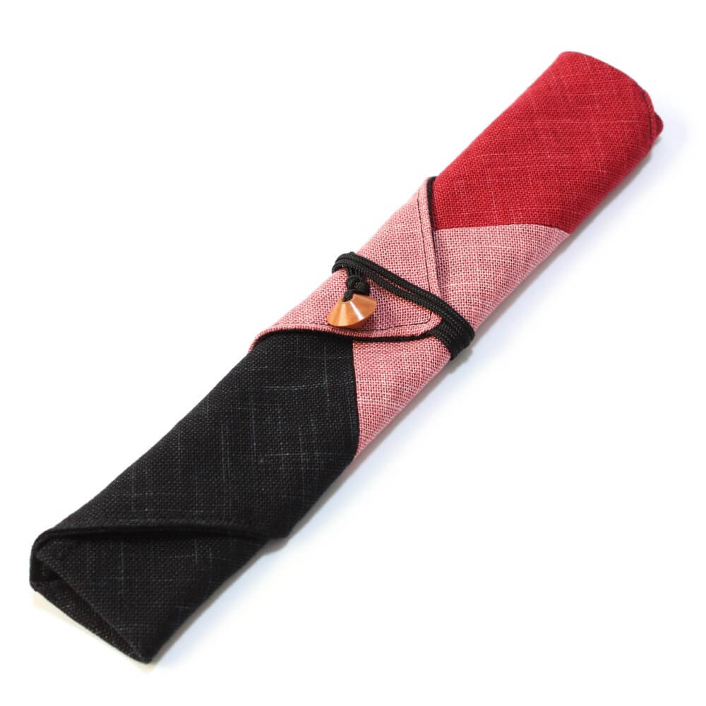 wafu pink fabric chopsticks case wrapped and secured with a string and abacus bead