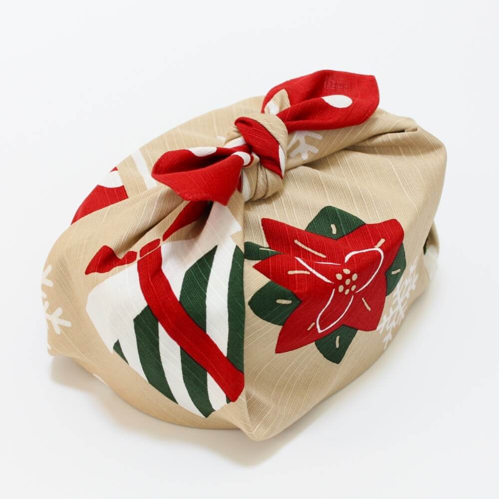 bento box wrapped in christmas furoshiki