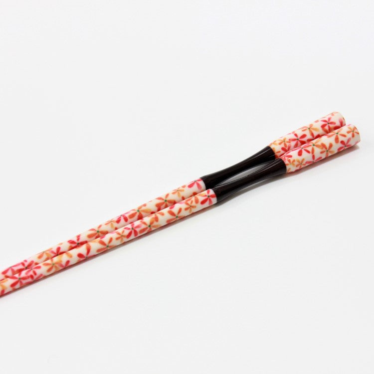 Japanese style chopsticks with curved neck.