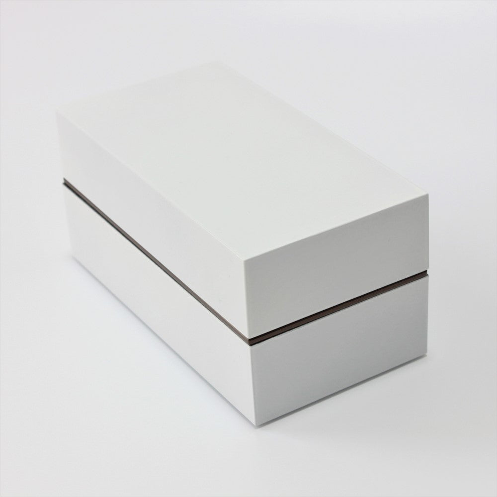 Two tier bento box with a glossy white surface and modern design sold at Majime Life