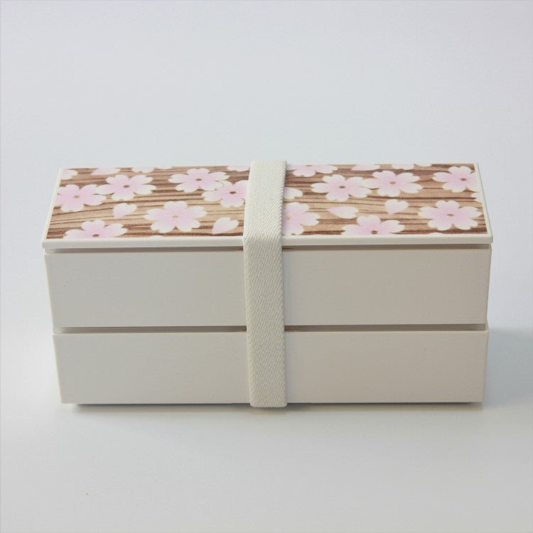 Side view with lunch band of the Sakura Mokume Slim Pink 2 Tier Bento Box