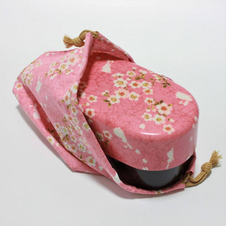 Image showing the sakura usagi pink bento box being stored in the lunch bag.