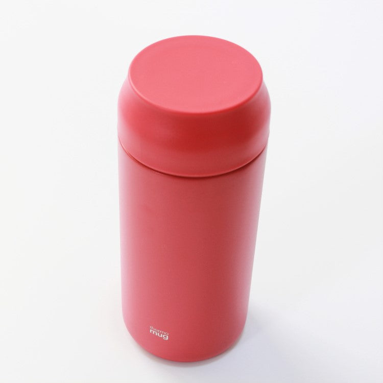 top angled shot showing side view of the leading red allday drink bottle from thermo mug