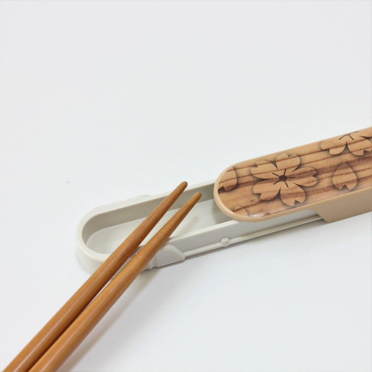Close up shot showing wooden chopsticks on Sakura Mokume Natural Case