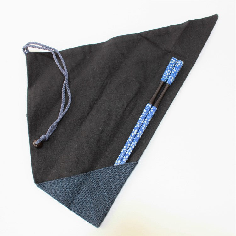 chopsticks tucked into this navy blue fabric chopsticks case