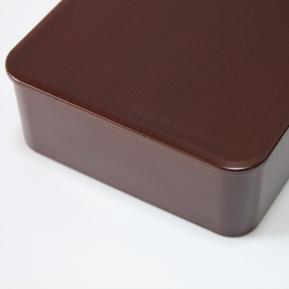 Top side view showing the fine wooden grain of this Japanese bento box 