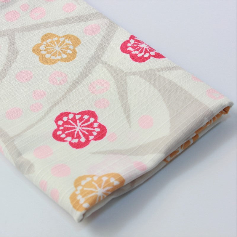 This furoshiki comes folded nicely. Photo showing folded furoshiki. 