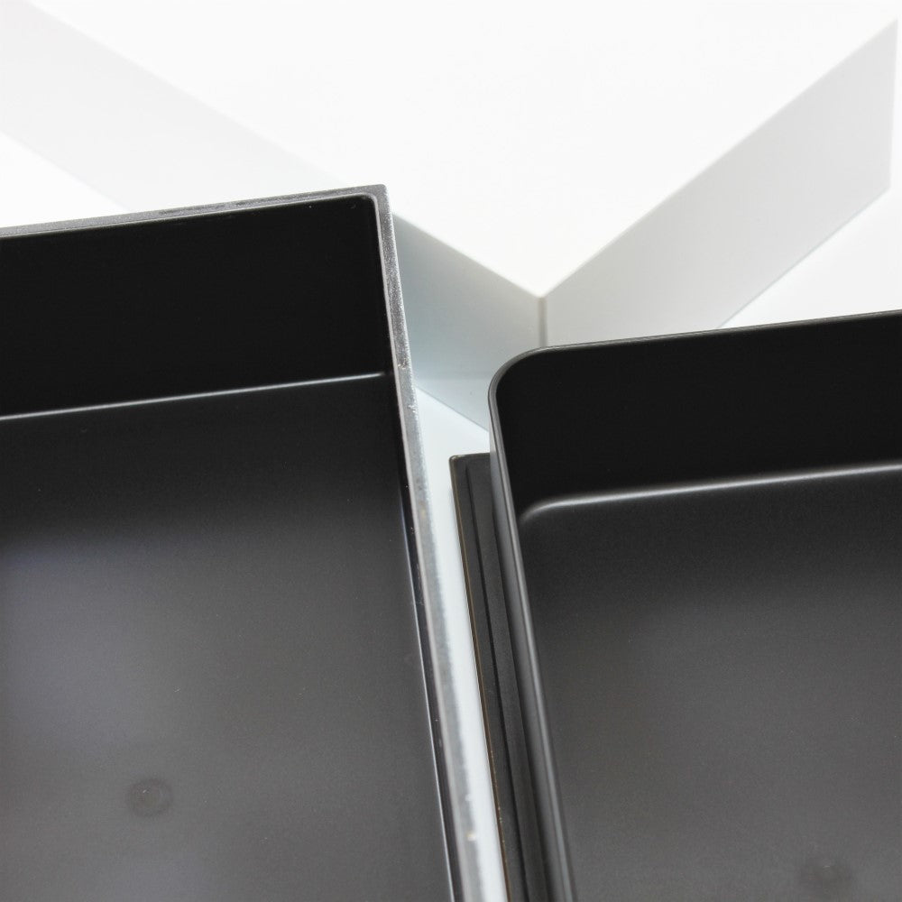 Close up show showing the smooth and high quality surface of the gloss white 2 tier bento box. 