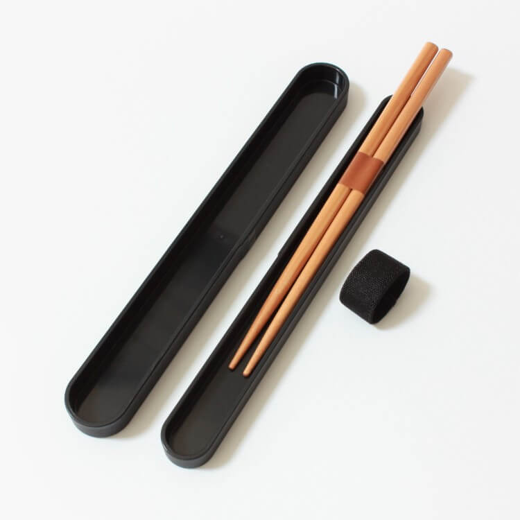 chopsticks case opened showing chopsticks and elastic band