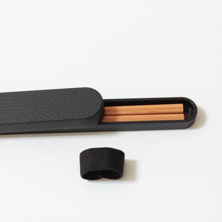 close up showing chopsticks inside case