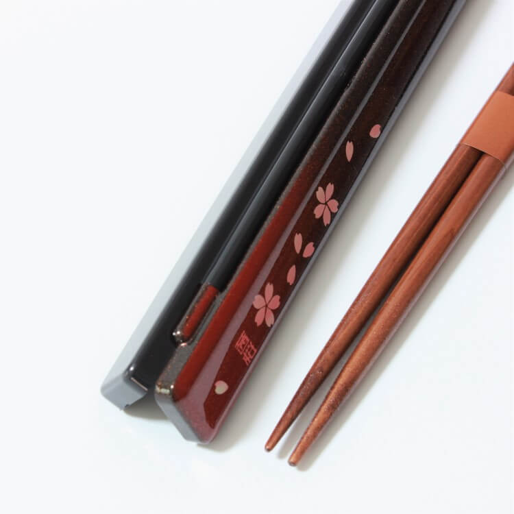 chopsticks case turned upside down to show hinges