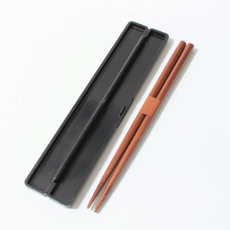 chopsticks removed from opened case