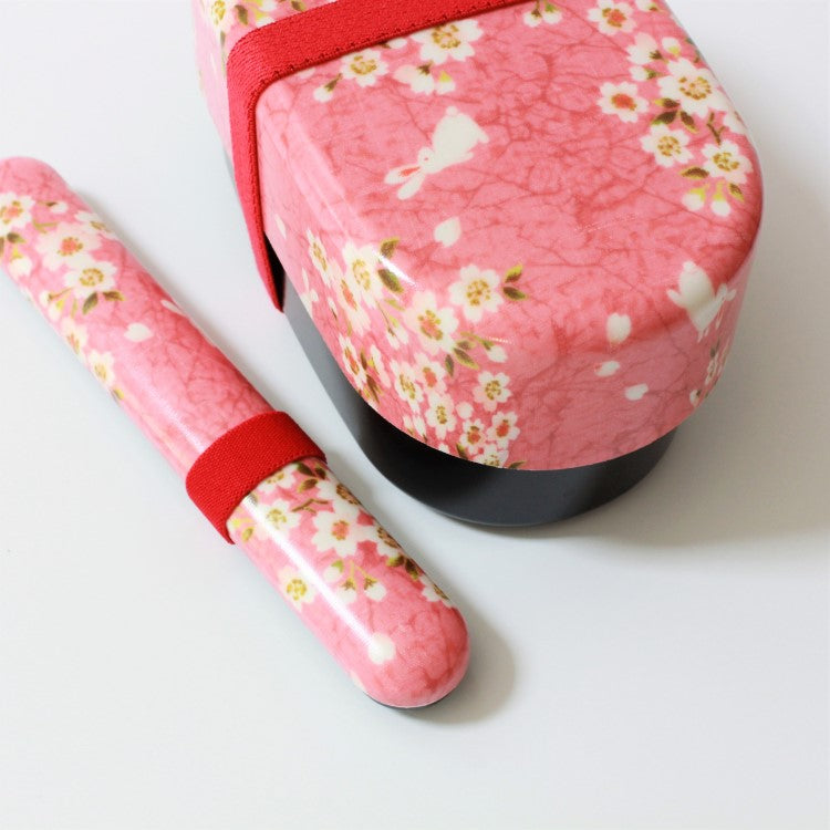 Close up shot showing the sakura usagi pink bento box and chopsticks case