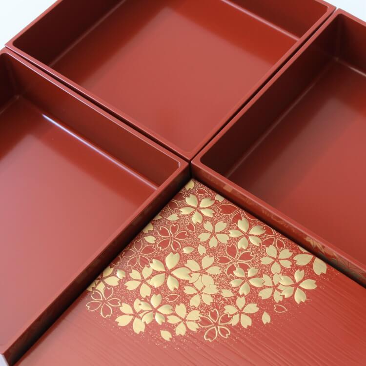 overhead photo showing smooth quality finish of the hanamaru vermillion picnic bento box