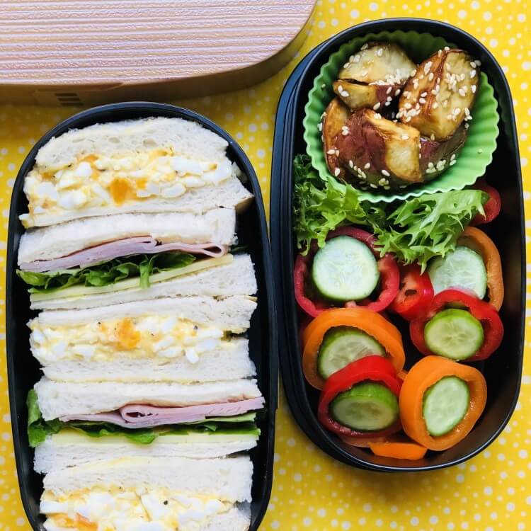 overhead shot showing sandwich and side dishes hinoki nuri wappa bento box